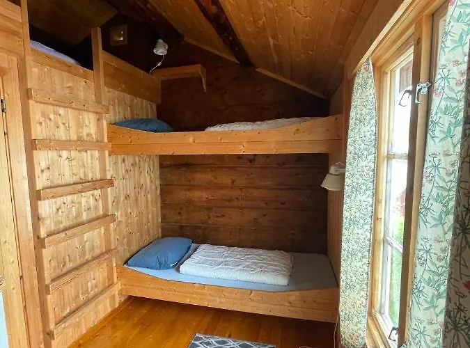 Деревянный коттедж Klingenberg Rorbuer *